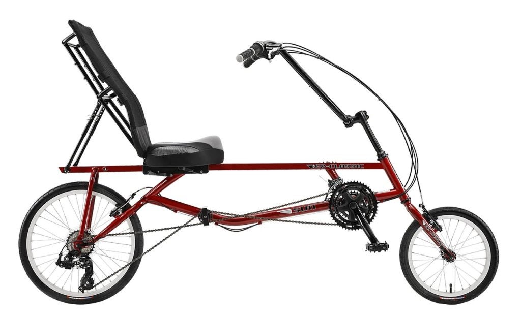 A recumbent bike places the rider in a reclined position with the cyclist’s legs pedaling forward, rather than down.