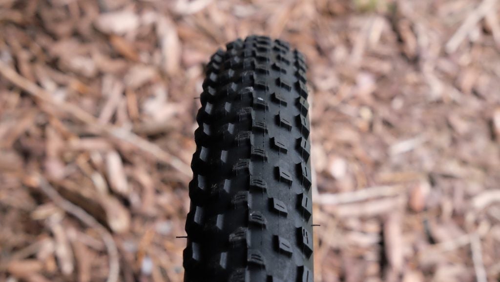 The Ascend Zion is equipped with knobby tires that work well on pavement, gravel and dirt.