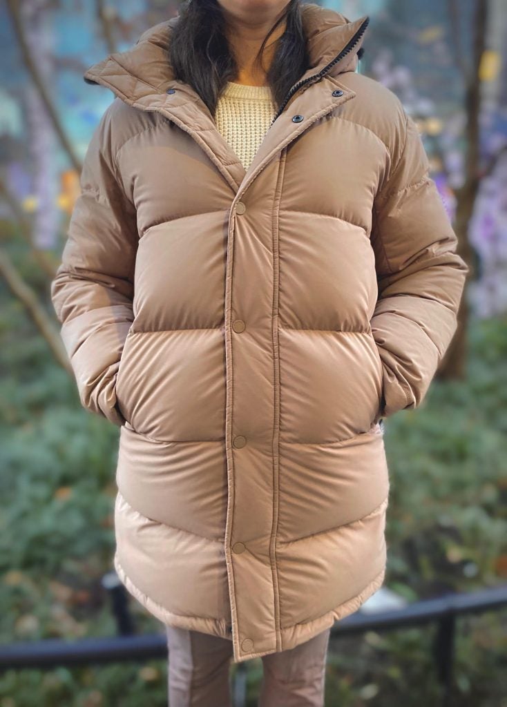Close-up front view of the author wearing the Aritzia Super Puff jacket