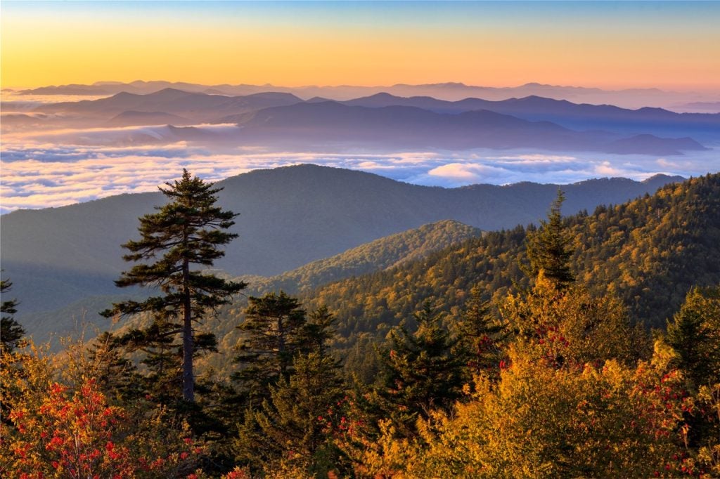 The sun rises over the Smoky Mountains at Clingman's Dome in Great Smoky Mountains National Park, Tennessee