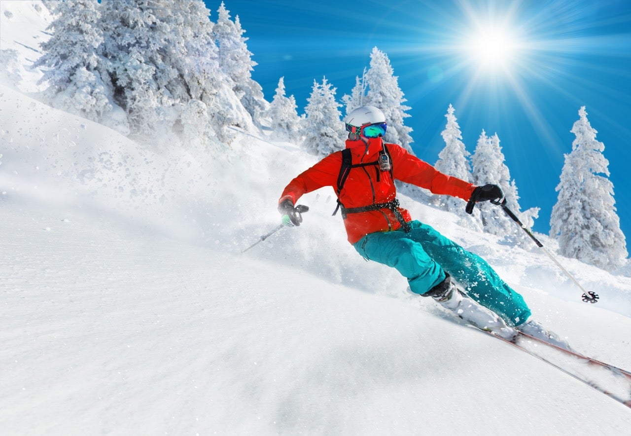 Ski packed powder to backcountry with a versatile pair of all mountain skis, we break down the years top models. Credit: Shutterstock/Lukas Gojda